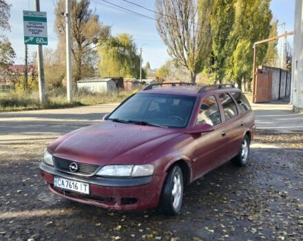 Красный Опель Вита, объемом двигателя 2 л и пробегом 350 тыс. км за 1250 $, фото 1 на Automoto.ua