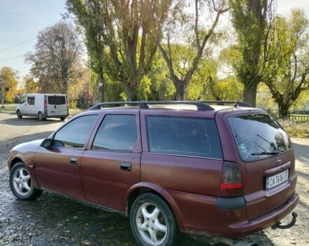 Красный Опель Вита, объемом двигателя 2 л и пробегом 350 тыс. км за 1250 $, фото 2 на Automoto.ua