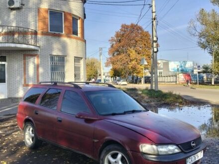 Красный Опель Вита, объемом двигателя 2 л и пробегом 350 тыс. км за 1250 $, фото 1 на Automoto.ua