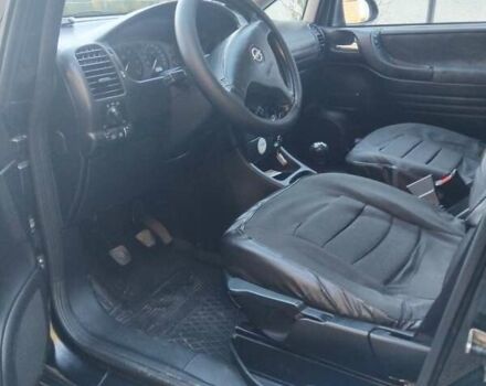 Черный Опель Зафира, объемом двигателя 2 л и пробегом 349 тыс. км за 3999 $, фото 7 на Automoto.ua