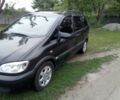 Черный Опель Зафира, объемом двигателя 2 л и пробегом 242 тыс. км за 3200 $, фото 1 на Automoto.ua
