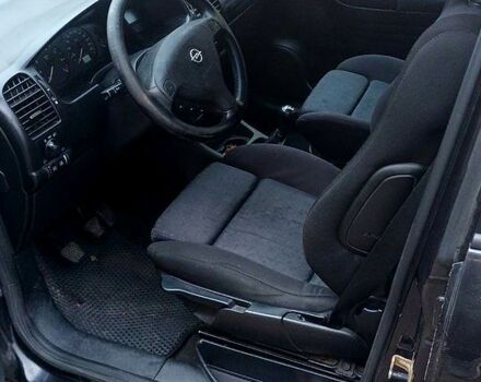 Черный Опель Зафира, объемом двигателя 1.8 л и пробегом 320 тыс. км за 3950 $, фото 10 на Automoto.ua