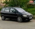 Черный Опель Зафира, объемом двигателя 2 л и пробегом 327 тыс. км за 3900 $, фото 1 на Automoto.ua