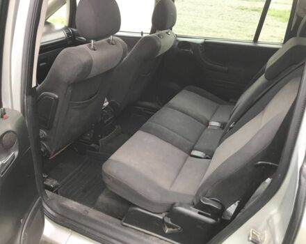 Черный Опель Зафира, объемом двигателя 2.2 л и пробегом 300 тыс. км за 700 $, фото 4 на Automoto.ua