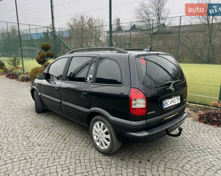 Черный Опель Зафира, объемом двигателя 2.17 л и пробегом 299 тыс. км за 2649 $, фото 3 на Automoto.ua