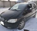 Черный Опель Зафира, объемом двигателя 2 л и пробегом 220 тыс. км за 3500 $, фото 1 на Automoto.ua