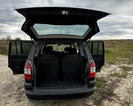 Черный Опель Зафира, объемом двигателя 2 л и пробегом 370 тыс. км за 3800 $, фото 1 на Automoto.ua