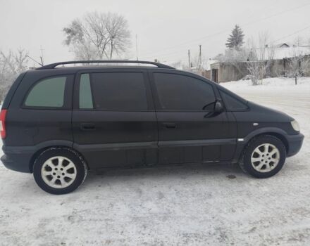 Черный Опель Зафира, объемом двигателя 1.6 л и пробегом 317 тыс. км за 2901 $, фото 1 на Automoto.ua