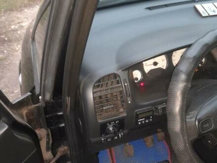 Черный Опель Зафира, объемом двигателя 2 л и пробегом 300 тыс. км за 4100 $, фото 1 на Automoto.ua