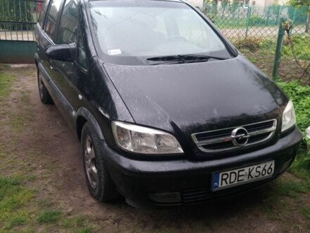 Черный Опель Зафира, объемом двигателя 1.9 л и пробегом 300 тыс. км за 2000 $, фото 1 на Automoto.ua