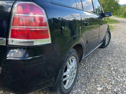 Черный Опель Зафира, объемом двигателя 1.9 л и пробегом 400 тыс. км за 3850 $, фото 1 на Automoto.ua