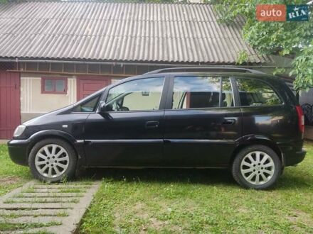 Черный Опель Зафира, объемом двигателя 2 л и пробегом 244 тыс. км за 4999 $, фото 1 на Automoto.ua