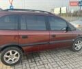 Красный Опель Зафира, объемом двигателя 2 л и пробегом 461 тыс. км за 3950 $, фото 1 на Automoto.ua
