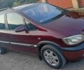 Красный Опель Зафира, объемом двигателя 1.8 л и пробегом 250 тыс. км за 2850 $, фото 1 на Automoto.ua