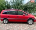 Красный Опель Зафира, объемом двигателя 2 л и пробегом 280 тыс. км за 2300 $, фото 1 на Automoto.ua