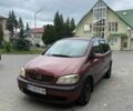 Красный Опель Зафира, объемом двигателя 1.6 л и пробегом 320 тыс. км за 1750 $, фото 1 на Automoto.ua