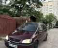 Красный Опель Зафира, объемом двигателя 2.2 л и пробегом 290 тыс. км за 2950 $, фото 1 на Automoto.ua