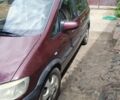 Красный Опель Зафира, объемом двигателя 2.2 л и пробегом 320 тыс. км за 3000 $, фото 1 на Automoto.ua