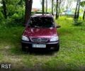 Красный Опель Зафира, объемом двигателя 2 л и пробегом 358 тыс. км за 4200 $, фото 1 на Automoto.ua