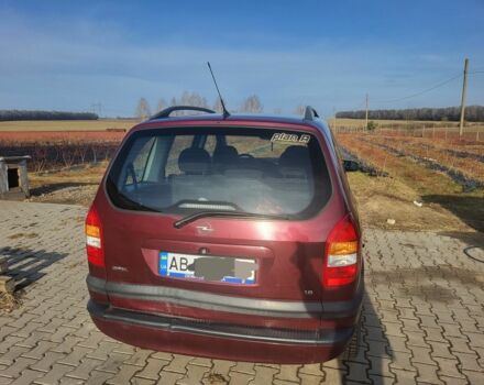 Красный Опель Зафира, объемом двигателя 1.8 л и пробегом 295 тыс. км за 2374 $, фото 1 на Automoto.ua