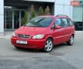 Красный Опель Зафира, объемом двигателя 2 л и пробегом 280 тыс. км за 3990 $, фото 1 на Automoto.ua