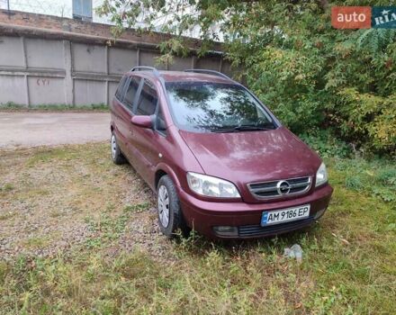 Опель Зафира 2004 в Коростене на Automoto.ua Красный Опель Зафира, объемом двигателя 2.17 л и пробегом 276 тыс. км за 3900 $, фото 10 на Automoto.ua