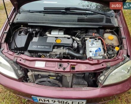 Опель Зафира 2004 в Коростене на Automoto.ua Красный Опель Зафира, объемом двигателя 2.17 л и пробегом 276 тыс. км за 3900 $, фото 3 на Automoto.ua