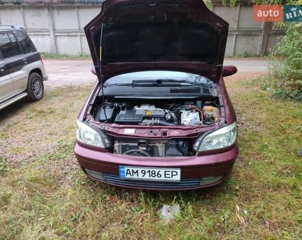 Опель Зафира 2004 в Коростене на Automoto.ua Красный Опель Зафира, объемом двигателя 2.17 л и пробегом 276 тыс. км за 3900 $, фото 8 на Automoto.ua