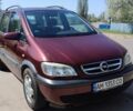 Красный Опель Зафира, объемом двигателя 1.6 л и пробегом 228 тыс. км за 3900 $, фото 1 на Automoto.ua