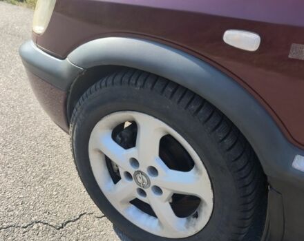 Красный Опель Зафира, объемом двигателя 2.2 л и пробегом 220 тыс. км за 2000 $, фото 4 на Automoto.ua