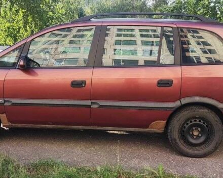 Красный Опель Зафира, объемом двигателя 1.6 л и пробегом 290 тыс. км за 3600 $, фото 1 на Automoto.ua