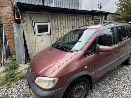 Красный Опель Зафира, объемом двигателя 1.6 л и пробегом 320 тыс. км за 2771 $, фото 1 на Automoto.ua