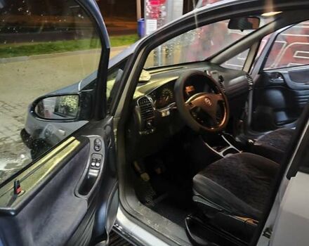 Серый Опель Зафира, объемом двигателя 1.8 л и пробегом 285 тыс. км за 3140 $, фото 2 на Automoto.ua