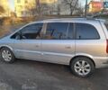 Серый Опель Зафира, объемом двигателя 1.6 л и пробегом 320 тыс. км за 3800 $, фото 1 на Automoto.ua