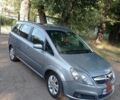 Серый Опель Зафира, объемом двигателя 1.8 л и пробегом 344 тыс. км за 5600 $, фото 1 на Automoto.ua