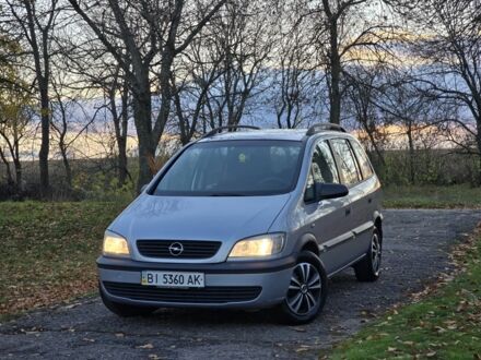 Серый Опель Зафира, объемом двигателя 1.8 л и пробегом 468 тыс. км за 3899 $, фото 1 на Automoto.ua