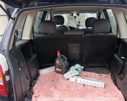 Синий Опель Зафира, объемом двигателя 1.8 л и пробегом 290 тыс. км за 2000 $, фото 1 на Automoto.ua