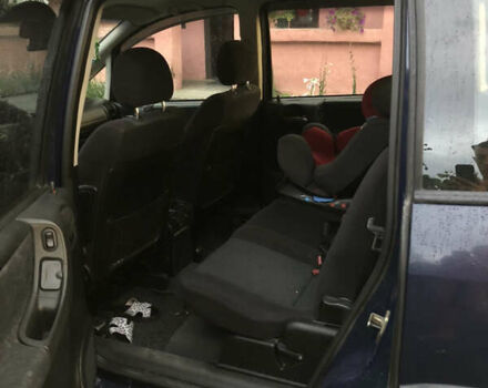 Синий Опель Зафира, объемом двигателя 2 л и пробегом 329 тыс. км за 3500 $, фото 4 на Automoto.ua