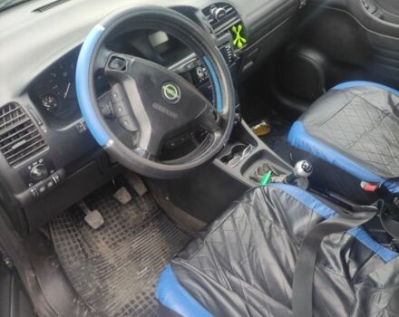 Синий Опель Зафира, объемом двигателя 2 л и пробегом 390 тыс. км за 4100 $, фото 7 на Automoto.ua