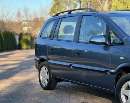 Синий Опель Зафира, объемом двигателя 2 л и пробегом 280 тыс. км за 2650 $, фото 2 на Automoto.ua