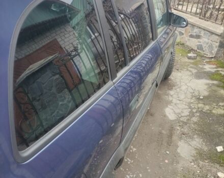 Синий Опель Зафира, объемом двигателя 2 л и пробегом 390 тыс. км за 4100 $, фото 4 на Automoto.ua