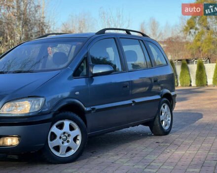 Синий Опель Зафира, объемом двигателя 2 л и пробегом 299 тыс. км за 2399 $, фото 1 на Automoto.ua