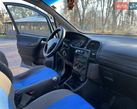 Синій Опель Зафіра, об'ємом двигуна 2 л та пробігом 299 тис. км за 2649 $, фото 18 на Automoto.ua