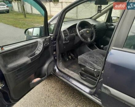 Синий Опель Зафира, объемом двигателя 1.99 л и пробегом 321 тыс. км за 3450 $, фото 11 на Automoto.ua