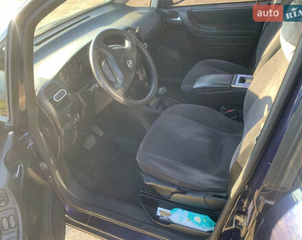 Синий Опель Зафира, объемом двигателя 1.8 л и пробегом 251 тыс. км за 4000 $, фото 6 на Automoto.ua