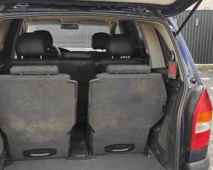 Синий Опель Зафира, объемом двигателя 2 л и пробегом 260 тыс. км за 3200 $, фото 1 на Automoto.ua