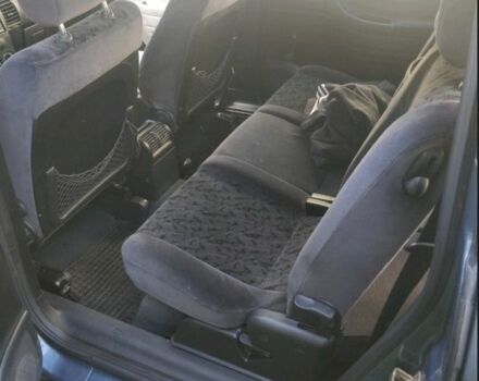 Синий Опель Зафира, объемом двигателя 2 л и пробегом 280 тыс. км за 3200 $, фото 2 на Automoto.ua