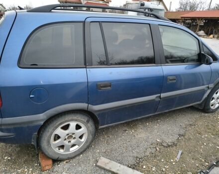 Синий Опель Зафира, объемом двигателя 2 л и пробегом 300 тыс. км за 1000 $, фото 1 на Automoto.ua