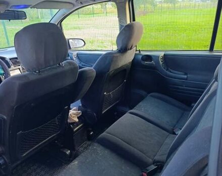 Синий Опель Зафира, объемом двигателя 1.99 л и пробегом 330 тыс. км за 3800 $, фото 4 на Automoto.ua