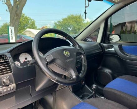 Синий Опель Зафира, объемом двигателя 1.8 л и пробегом 357 тыс. км за 4000 $, фото 7 на Automoto.ua